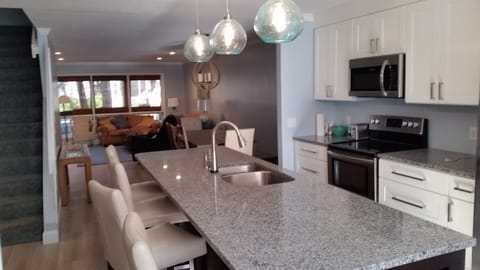 New remodel large open kitchen. Tile floor throughout, no transitions.