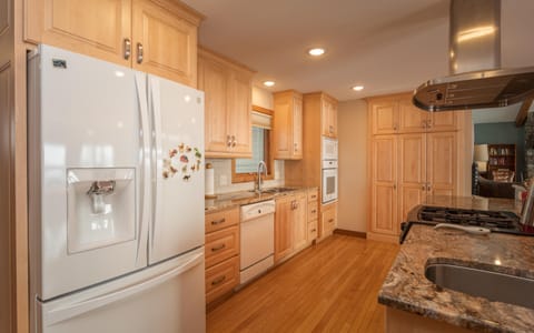 The kitchen is well stocked, 2 ovens, microwave, dishwasher, garbage compactor.