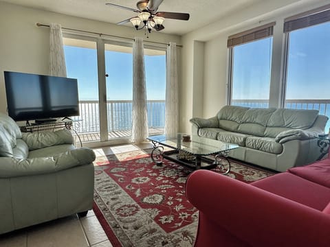 Beach & Westerly coastal views from inside windows & wraparound balcony.