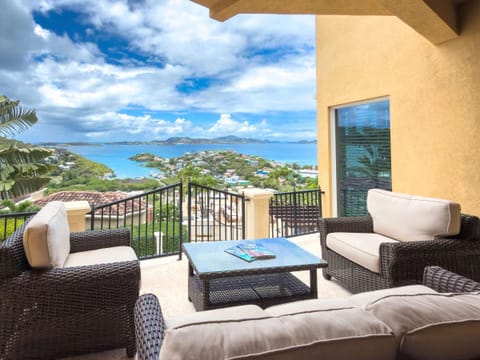 Spacious patio with cozy seating and stunning mountain views