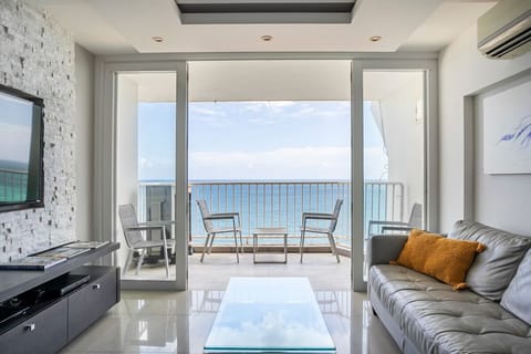 Breathtaking ocean views from the living room with a 55" flat screen TV.