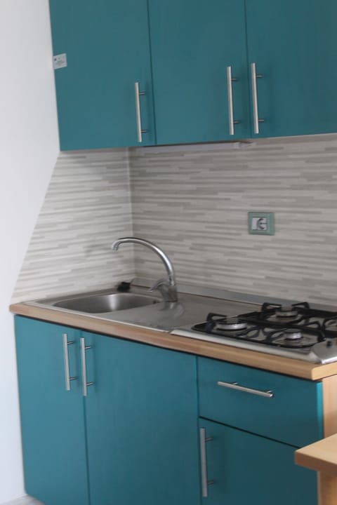 Economy Apartment, 2 Bedrooms, Garden View, Ground Floor | Private kitchen | Full-size fridge, stovetop, cookware/dishes/utensils, freezer