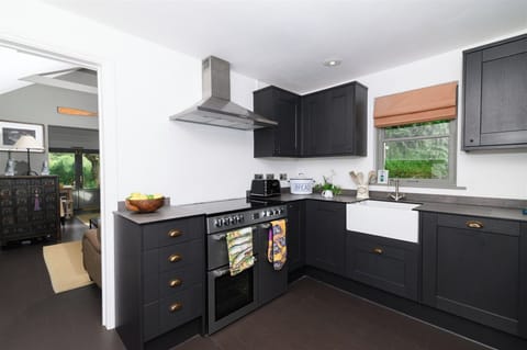 Well equipped kitchen with large Range cooker, dishwasher & washing machine.