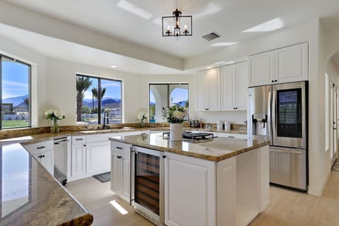 Chef's kitchen with all new stainless steel appliances.