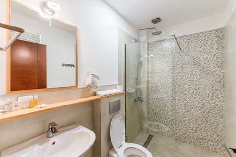 Shower, free toiletries, hair dryer, slippers