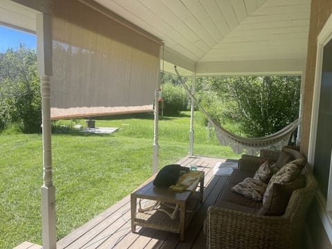 Comfortable seating on the wrap-around portal is perfect for field gazing