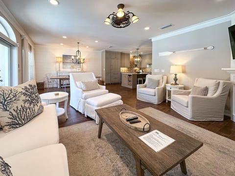 Coastal-inspired living space with room for everyone and entertainment options including cable and Smart T