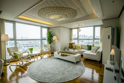 Luxury Apartment - Foreigner Only (Superior Cozy Home) | Living room | 50-inch flat-screen TV with cable channels, TV