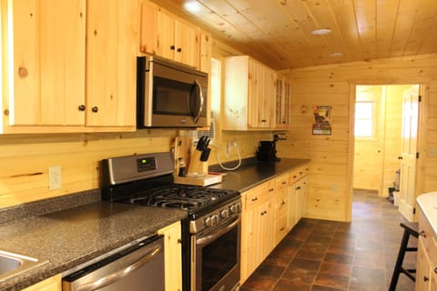 Kitchen view looking into laundry room.