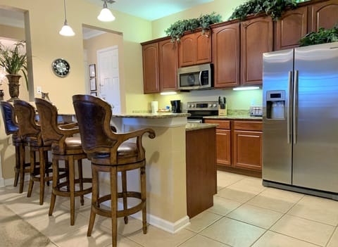 Fully equipped kitchen with stainless steel appliances
