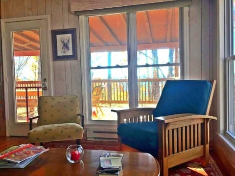 Sun Room that leads to terrace. Feels like you are living on a tree house!