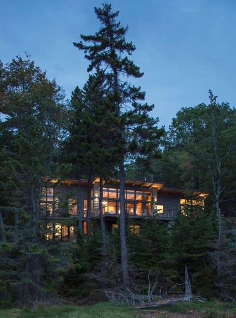 As seen from the shore at dusk