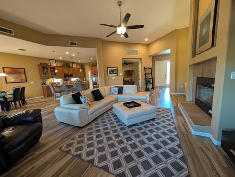 Great room with fireplace and TV