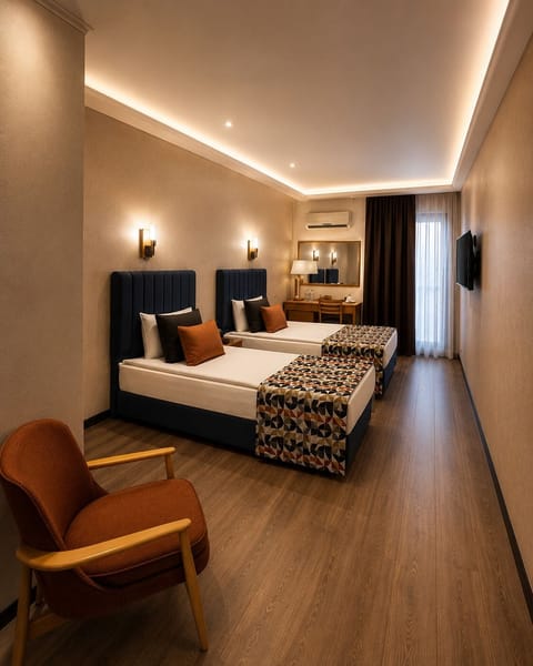 Twin Room | Desk, WiFi (free), bed sheets