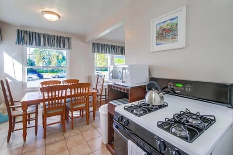 Kitchen into the dining room with seating for 6