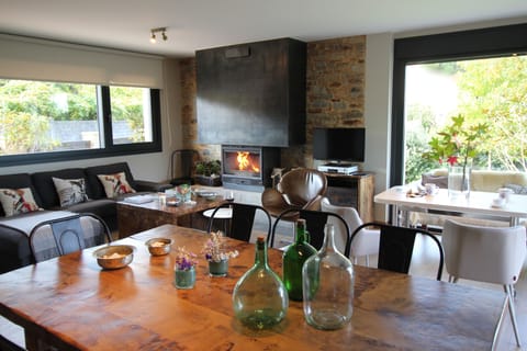 Spacious living room with fireplace and beautiful valley views