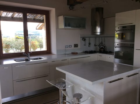 Gas hob, electric oven and microwave