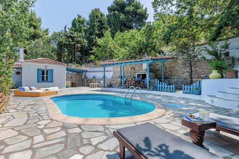 Private pool surrounded by lush garden space — perfect for sun-filled days.