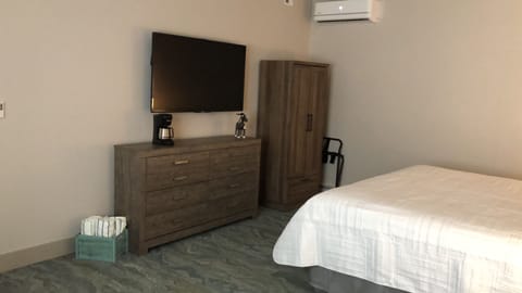 Deluxe Quadruple Room, 1 King Bed with Sofa bed, Non Smoking | In-room safe, blackout drapes, iron/ironing board, free WiFi