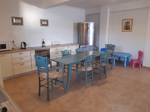 Basement additional kitchen with seating