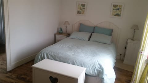 guest bedroom with access to upstairs bathroom

