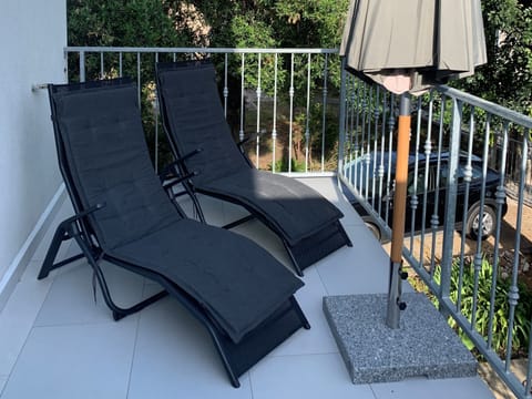 Loungers on top front balcony