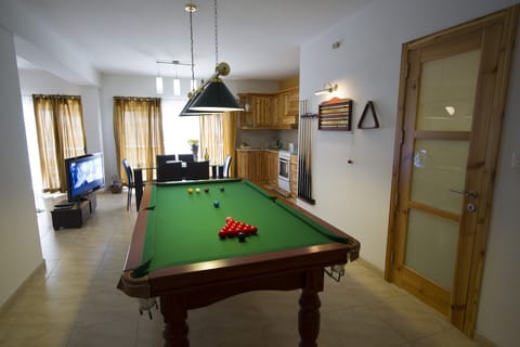 Kitchen as seen from Snooker Area, Rotating TV, Spare Bathroom on right