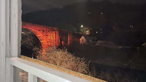 View of the Iron Bridge in the evening from the lounge. Illuminated in red