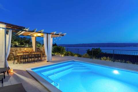 Private heated pool and open sea view from the whole property.
