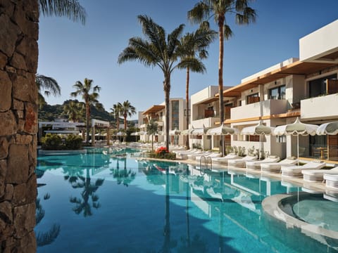 3 outdoor pools, pool umbrellas, sun loungers