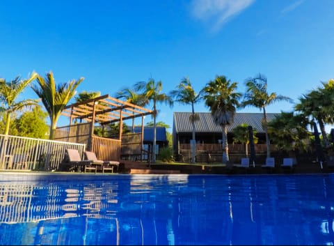 Outdoor pool, pool umbrellas, sun loungers