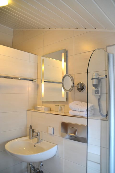 Shower, free toiletries, hair dryer, towels