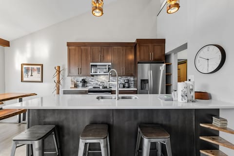 Kitchen island with bar stools