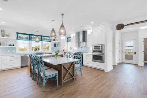Dining table next to the kitchen island