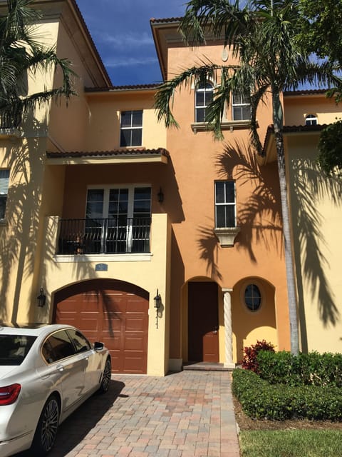 Beautiful arched entry-way with Parking for 2 and One Car Garage