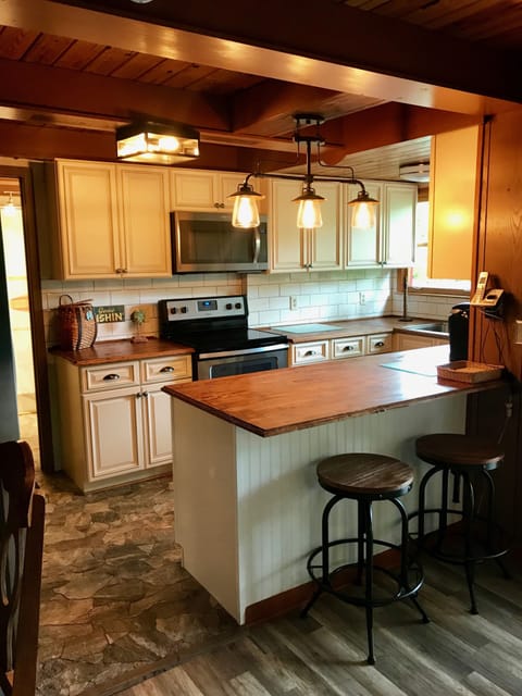 Rustic chic lighting and newly laid stone and wood flooring!