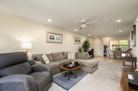 Living room boasts a sofa bed couch and power recliner.
