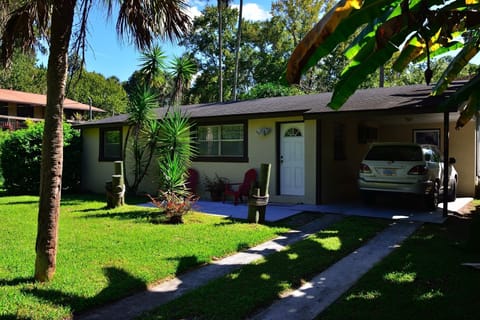 Fish Bowl House with carport