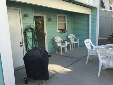 Back door area with weber grill.