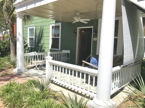 The Middle of it All welcomes you to our shady porch and swing!