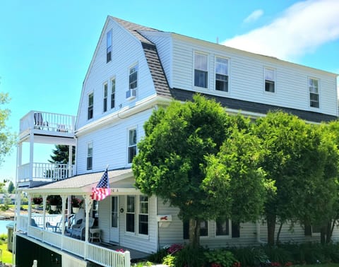 First Floor Condo, parking right outside , wrap around porch overlooking gardens