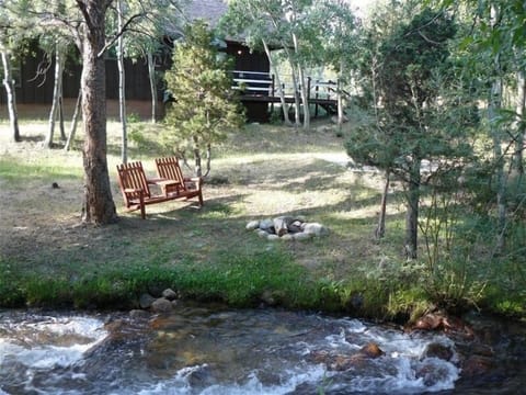 Relax next to picturesque aspen-lined creek w/seating, fire pit & picnic table.