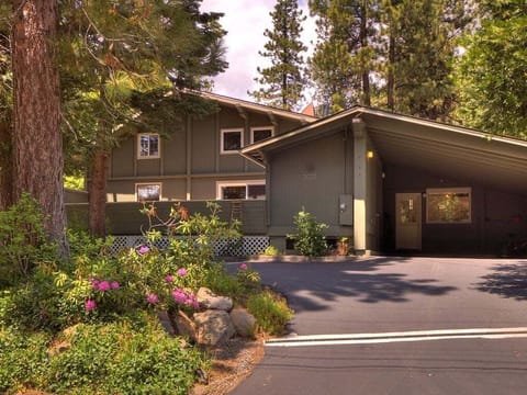 With a two-car carport and a three-car driveway, the front of the house provides ample parking space for multiple vehicles