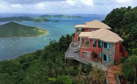 Caribbean breezes flow up the mountain, cooling the villa