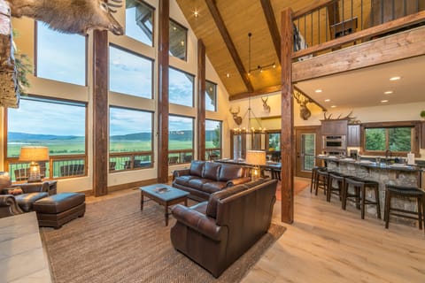 Enjoy your family and friends in the great room with scenic views.
