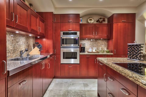 Kitchen with two Sub Zero refrigerators, microwave, Viking stove, & dishwasher 