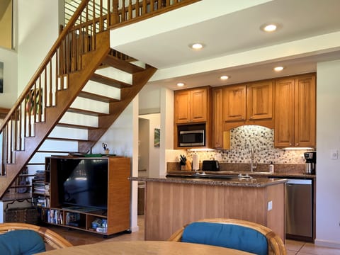 Kitchen and hallway to main bathroom and master bedroom.