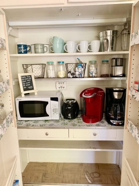 Kitchen Goodies Closet. Coffee pods provided. Tea kettle & French press too