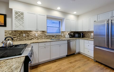 Large kitchen with under counter lighting