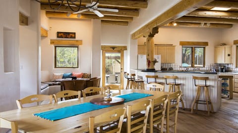 The dining room, bar, kitchen, breakfast nook and library all flow together
